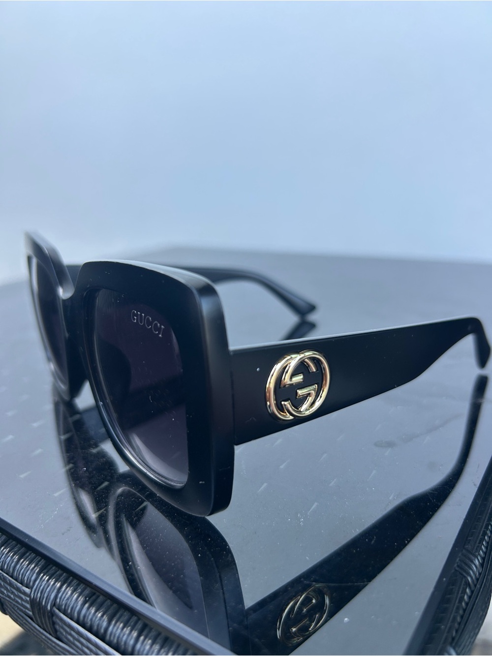 Gucci Black Sunglasses with Gold GG Medallion